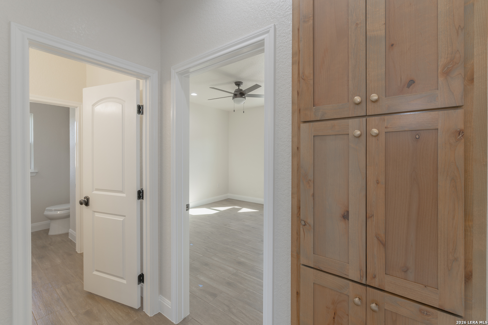 591 Eichman Road Poteet, TX 78065 - Photo 16 of 22 a view of a bathroom with a glass door shower
