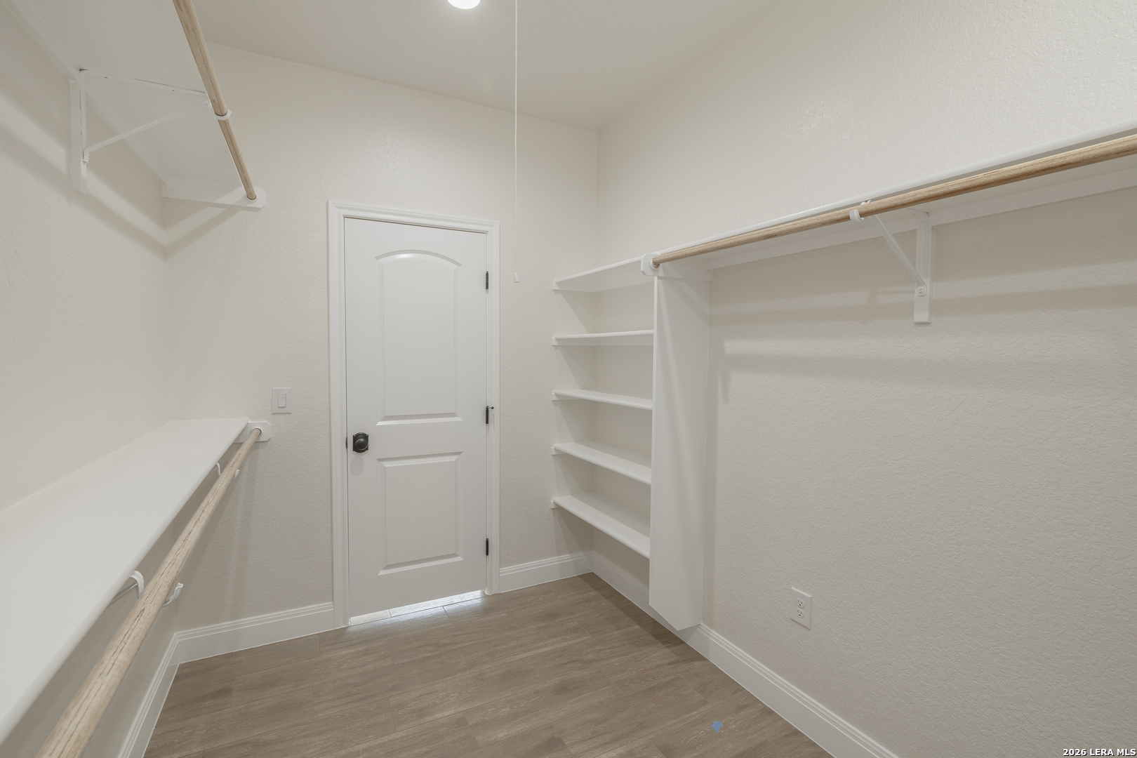 591 Eichman Road Poteet, TX 78065 - Photo 19 of 22 a view of an empty walk in closet