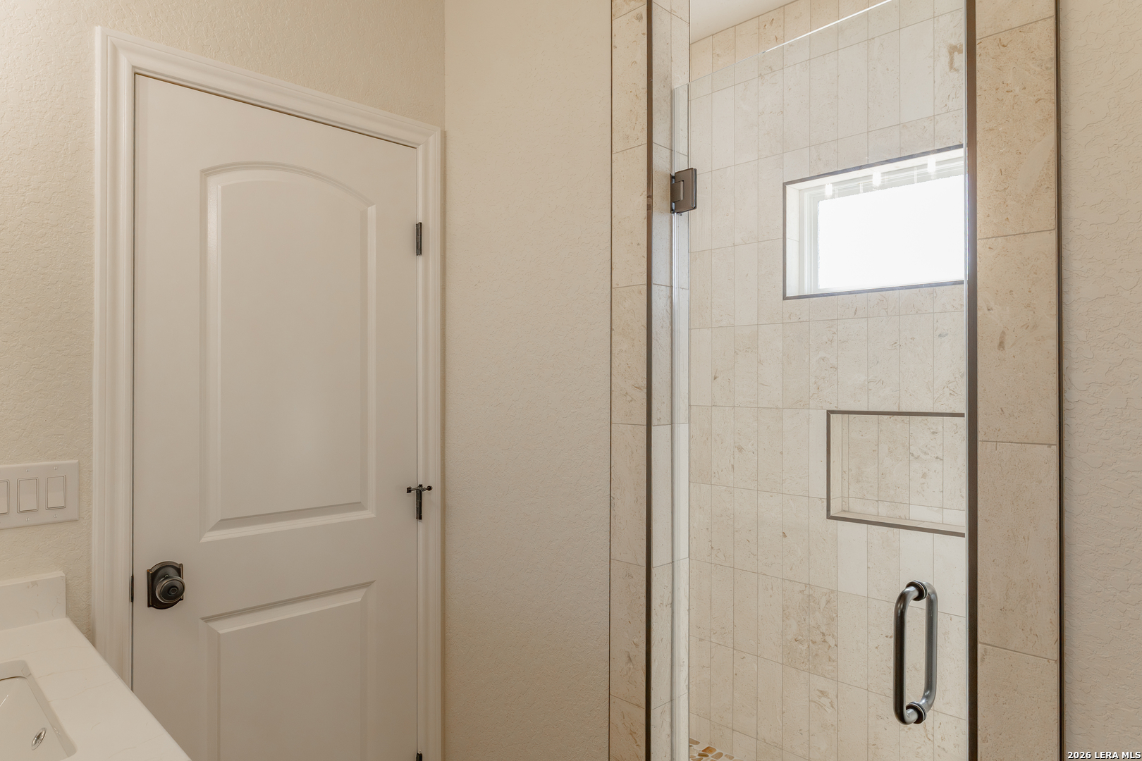 591 Eichman Road Poteet, TX 78065 - Photo 3 of 22 a bathroom with a shower