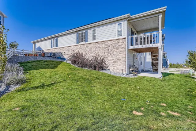 a view of a back yard of the house