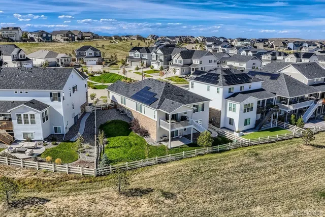 a view of a swimming pool with a lot of chairs