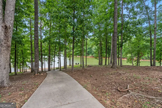 a house view with a backyard space