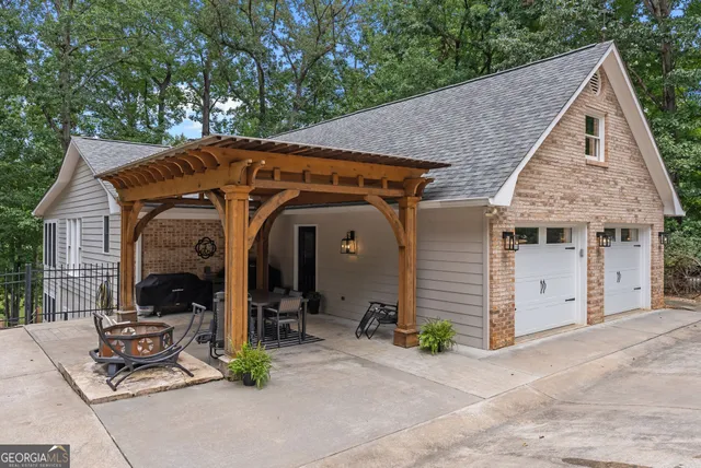a view of a dining room with furniture wooden floor and chandelier