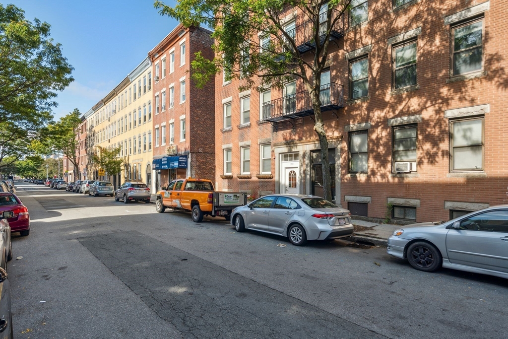 172 Cottage Street, Unit 2 Boston, MA 02128 - Photo 29 of 33 a view of cars parked on the side of a street