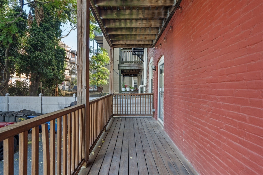 172 Cottage Street, Unit 2 Boston, MA 02128 - Photo 31 of 33 a view of a balcony with wooden floor
