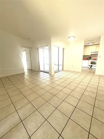 a view of a room and window