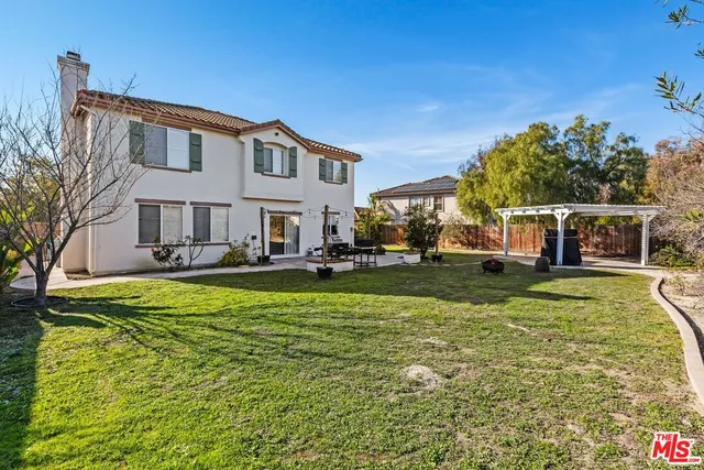 a view of a house with a big yard