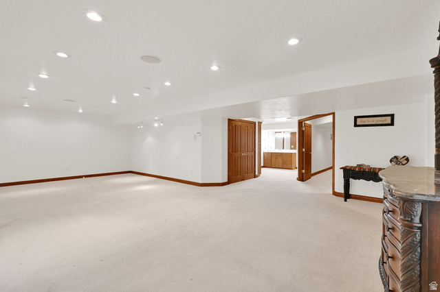 1085 Windsor Drive Provo, UT 84604 - Photo 59 of 83 Finished below grade area with recessed lighting and light colored carpet