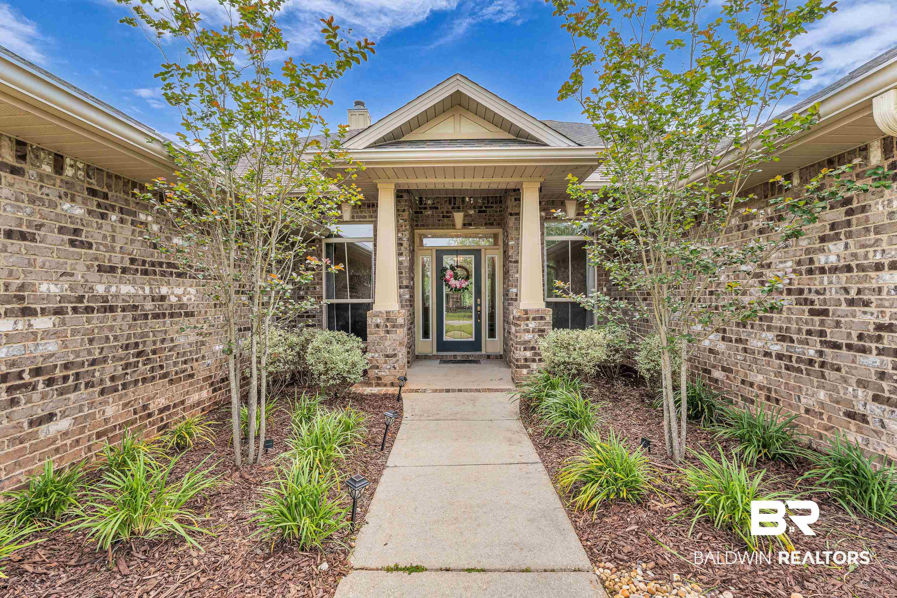 242 Meadow Run Loop East Foley, AL 36535 - Photo 1 of 52 Doorway to property with brick siding