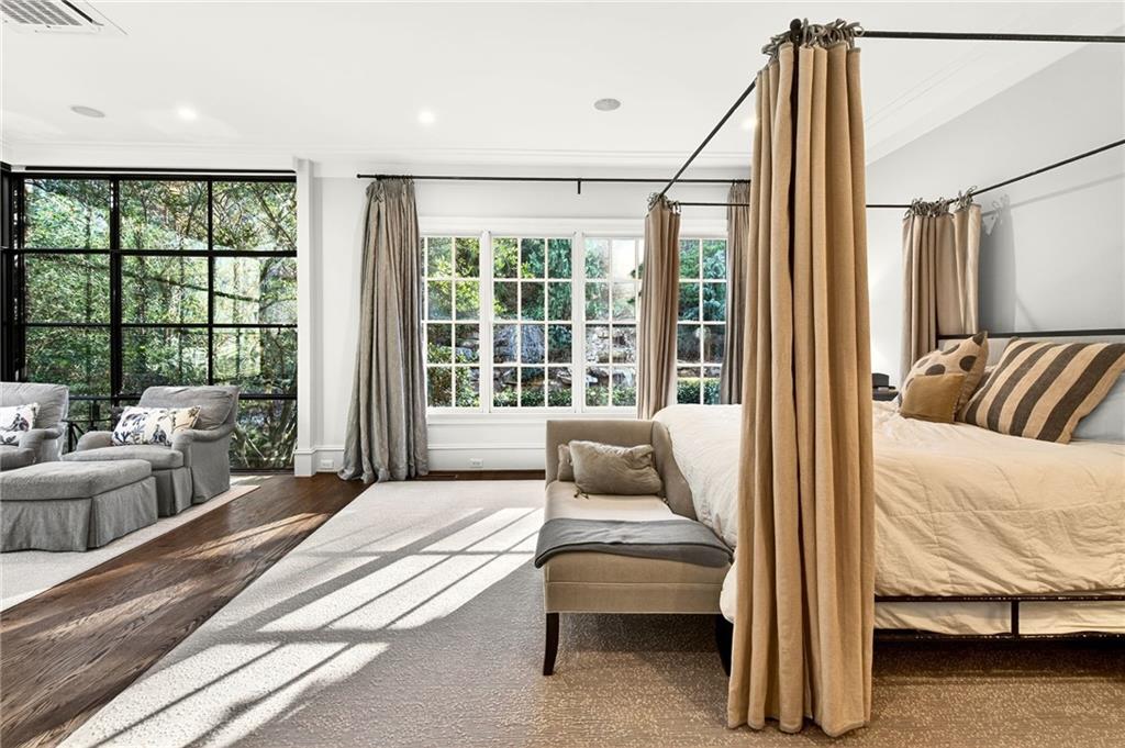 120 Burdette Trail Atlanta, GA 30327 - Photo 21 of 69 a bedroom with furniture and a large window