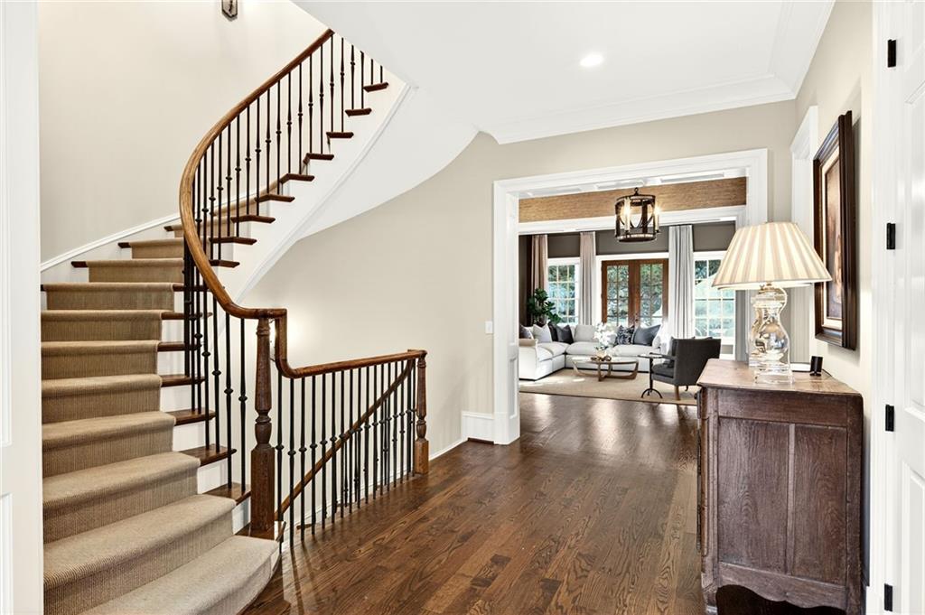 120 Burdette Trail Atlanta, GA 30327 - Photo 31 of 69 a view of living room and dining room with wooden floor