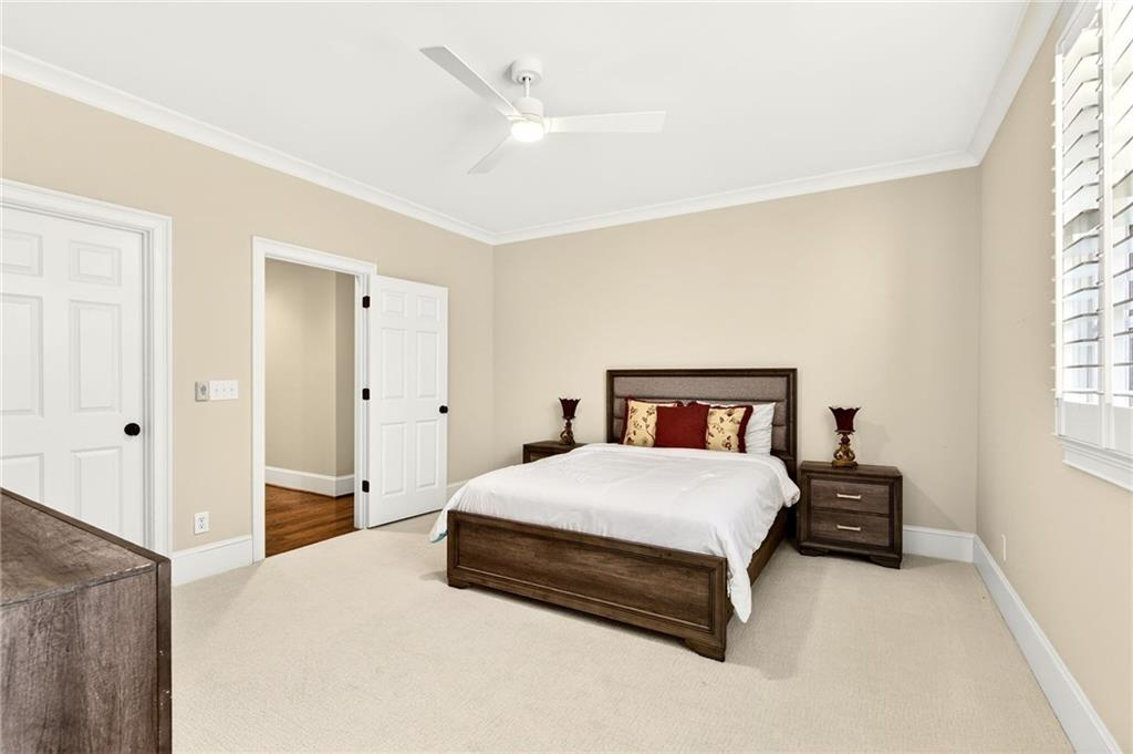 120 Burdette Trail Atlanta, GA 30327 - Photo 33 of 69 a bedroom with a bed and a window