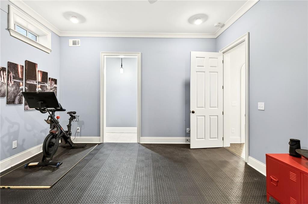 120 Burdette Trail Atlanta, GA 30327 - Photo 57 of 69 a view of a room with gym equipment