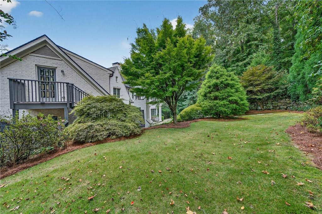 120 Burdette Trail Atlanta, GA 30327 - Photo 66 of 69 a front view of a house with a yard