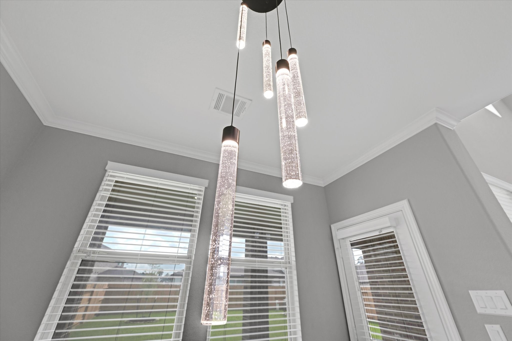 3834 Supremes Trail Spring, TX 77386 - Photo 19 of 37 Breakfast area accented by a modern bubble crystal chandelier.