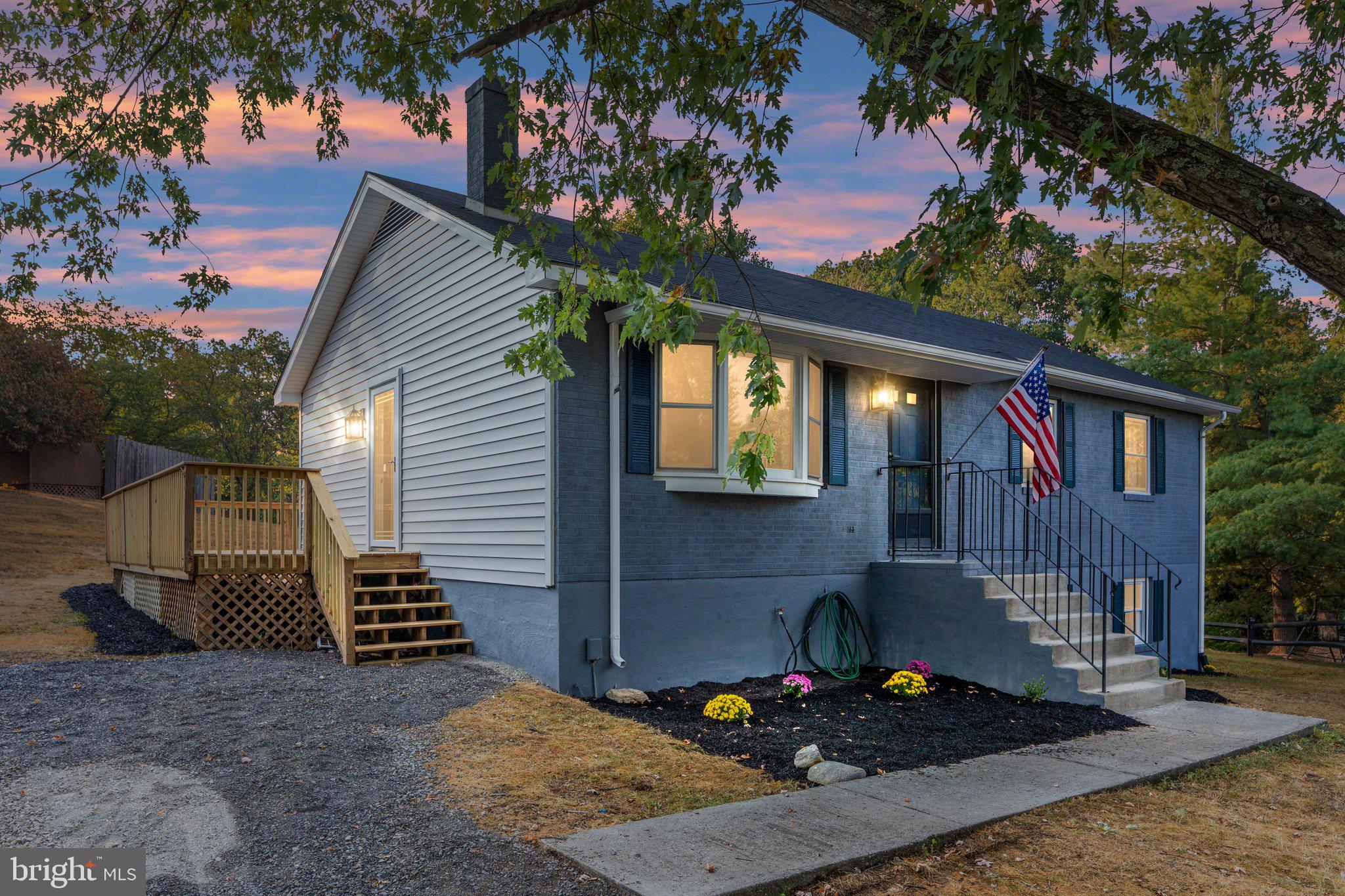 123 Woodside Circle Stephens City, VA 22655 - Photo 1 of 25 a view of a house with a patio