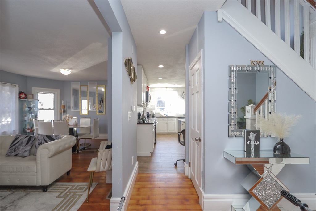 58 Willard Avenue Springfield, MA 01109 - Photo 16 of 32 a living room with furniture and a table