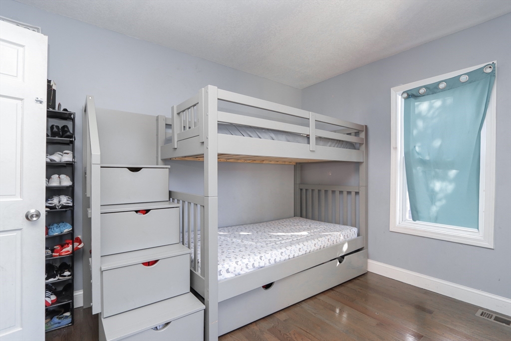 58 Willard Avenue Springfield, MA 01109 - Photo 24 of 32 a bedroom with bed and window