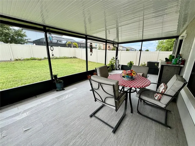a house view with a sitting space and garden space