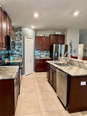 a room with lots of different colored cloths