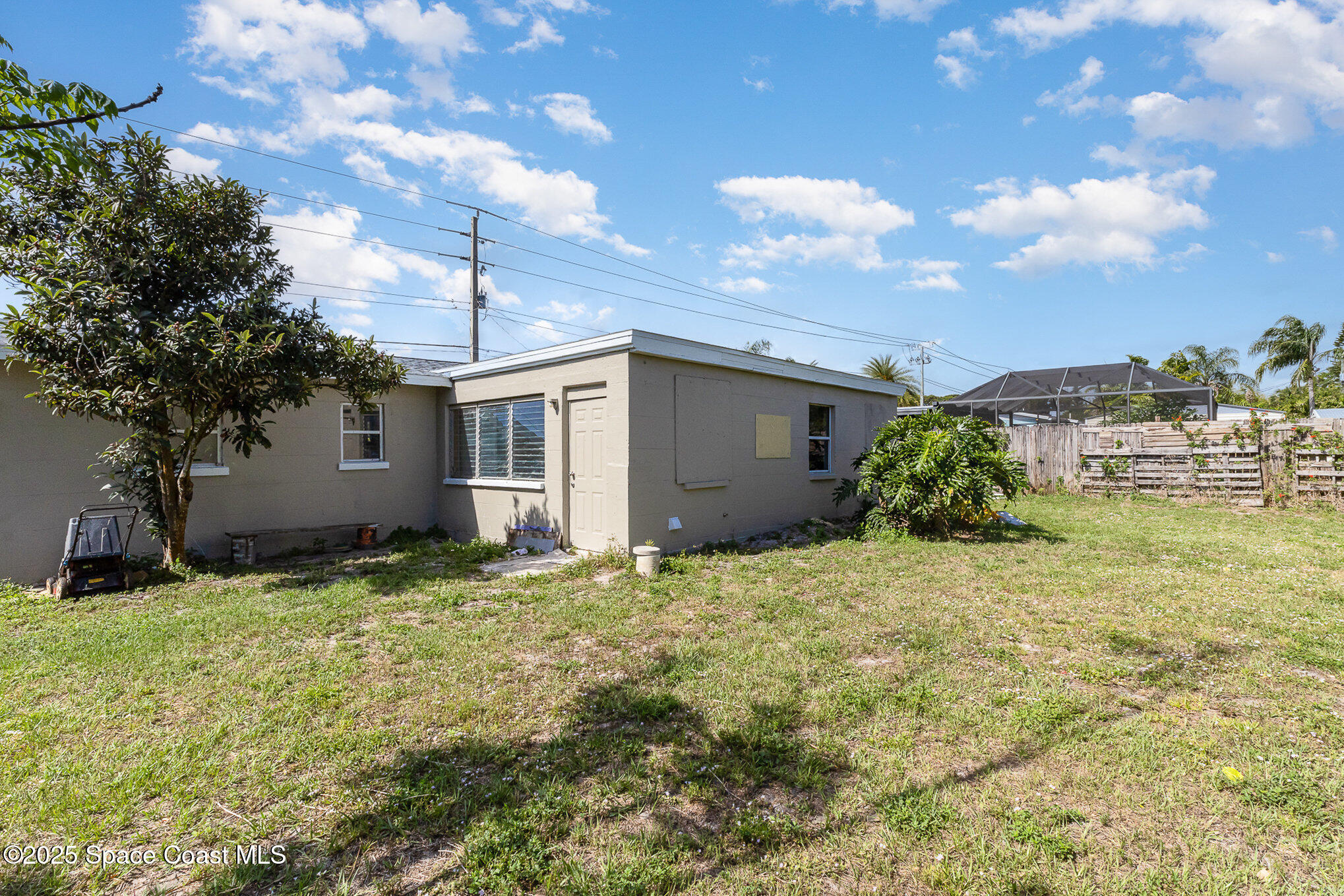 2234 Post Road Melbourne, FL 32935 - Photo 22 of 29 a backyard of a house