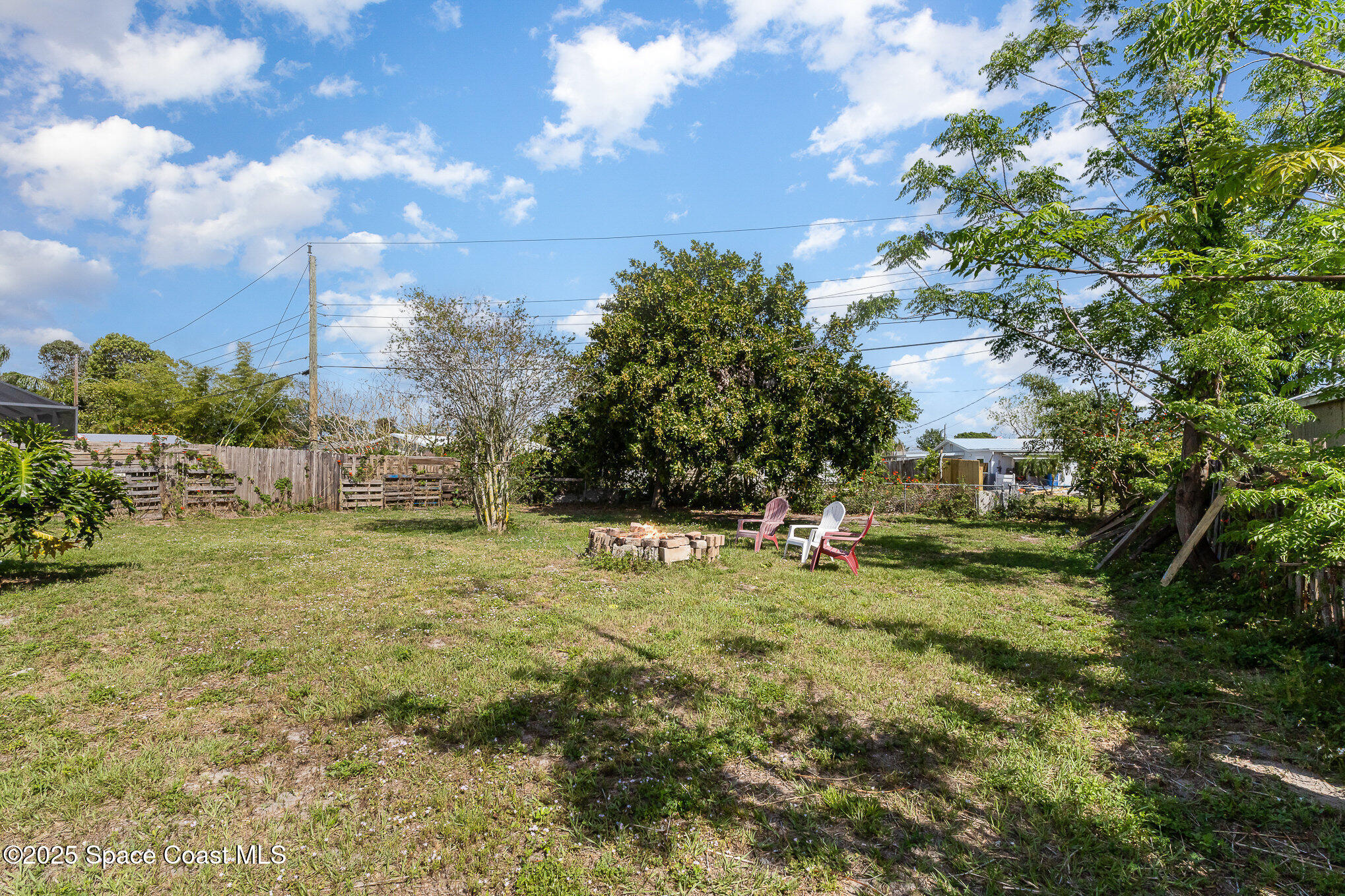 2234 Post Road Melbourne, FL 32935 - Photo 25 of 29 a view of a big yard with large trees