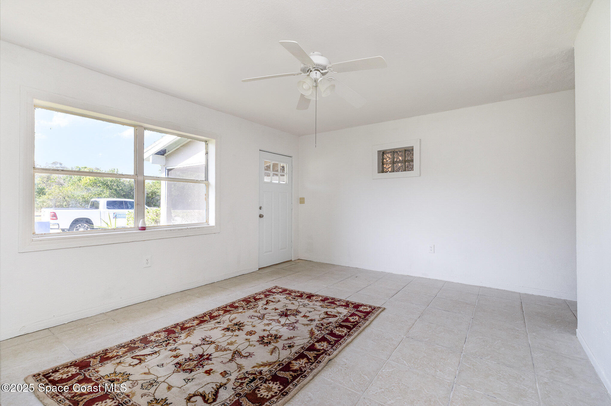 2234 Post Road Melbourne, FL 32935 - Photo 5 of 29 a view of an empty room with a window