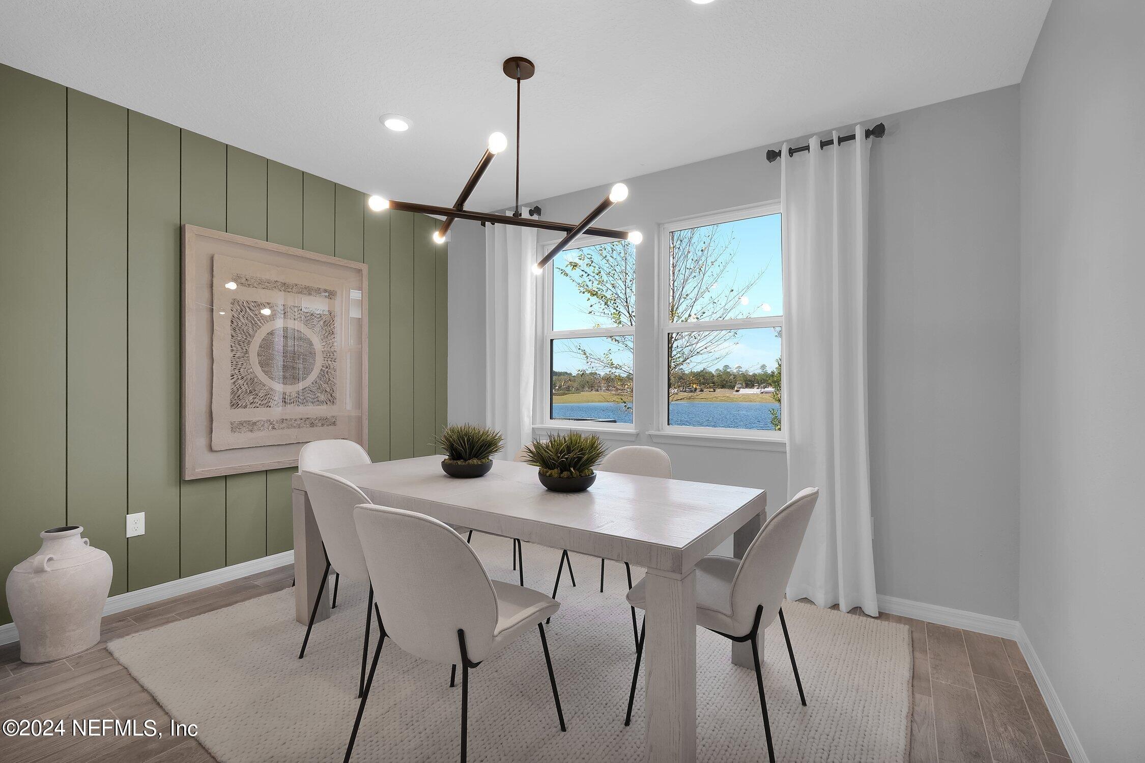 44 Torres Trace St. Augustine, FL 32095 - Photo 9 of 24 a dining room with furniture and window