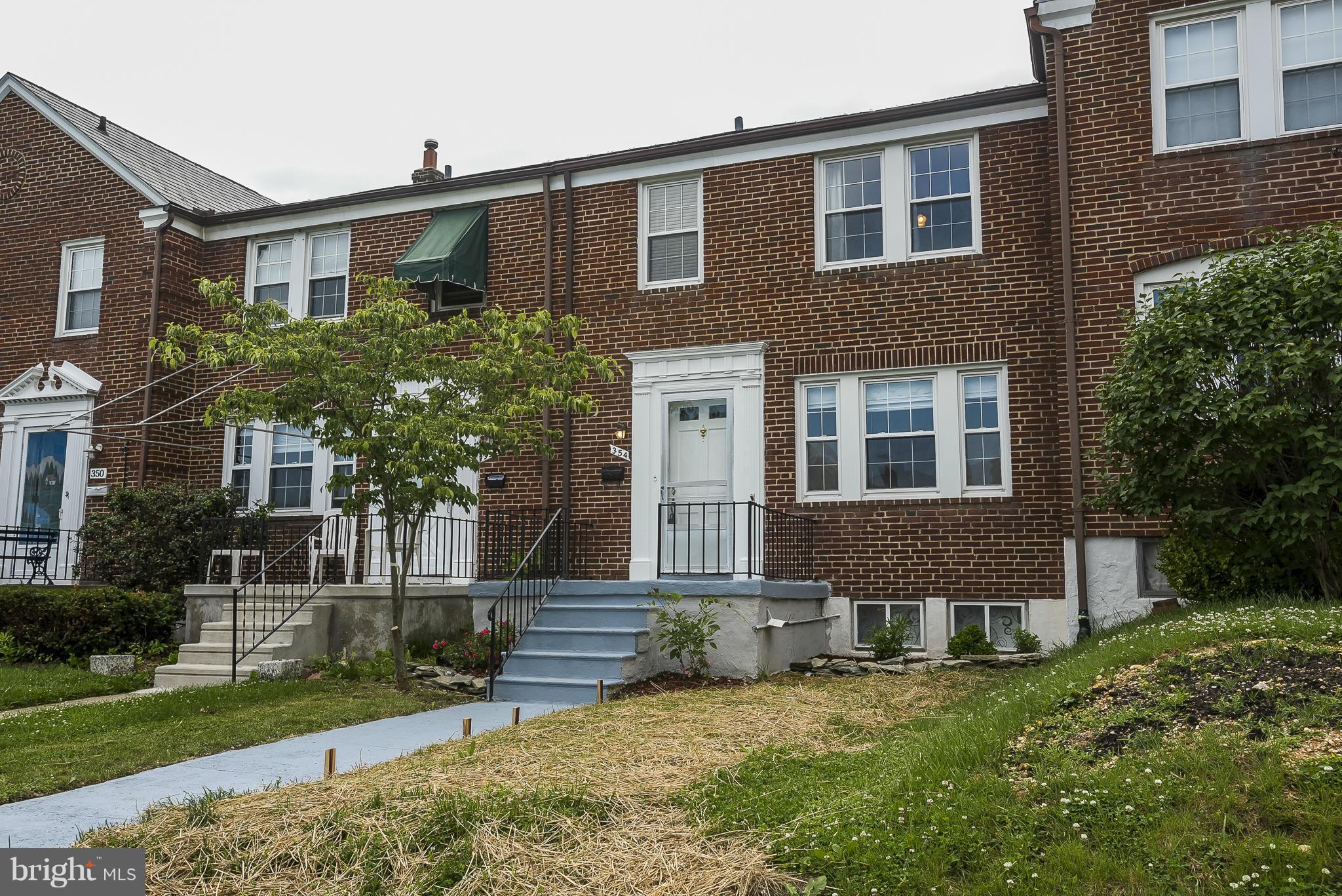 354 Greenlow Road Catonsville, MD 21228 - Photo 1 of 20 a front view of a house with a yard