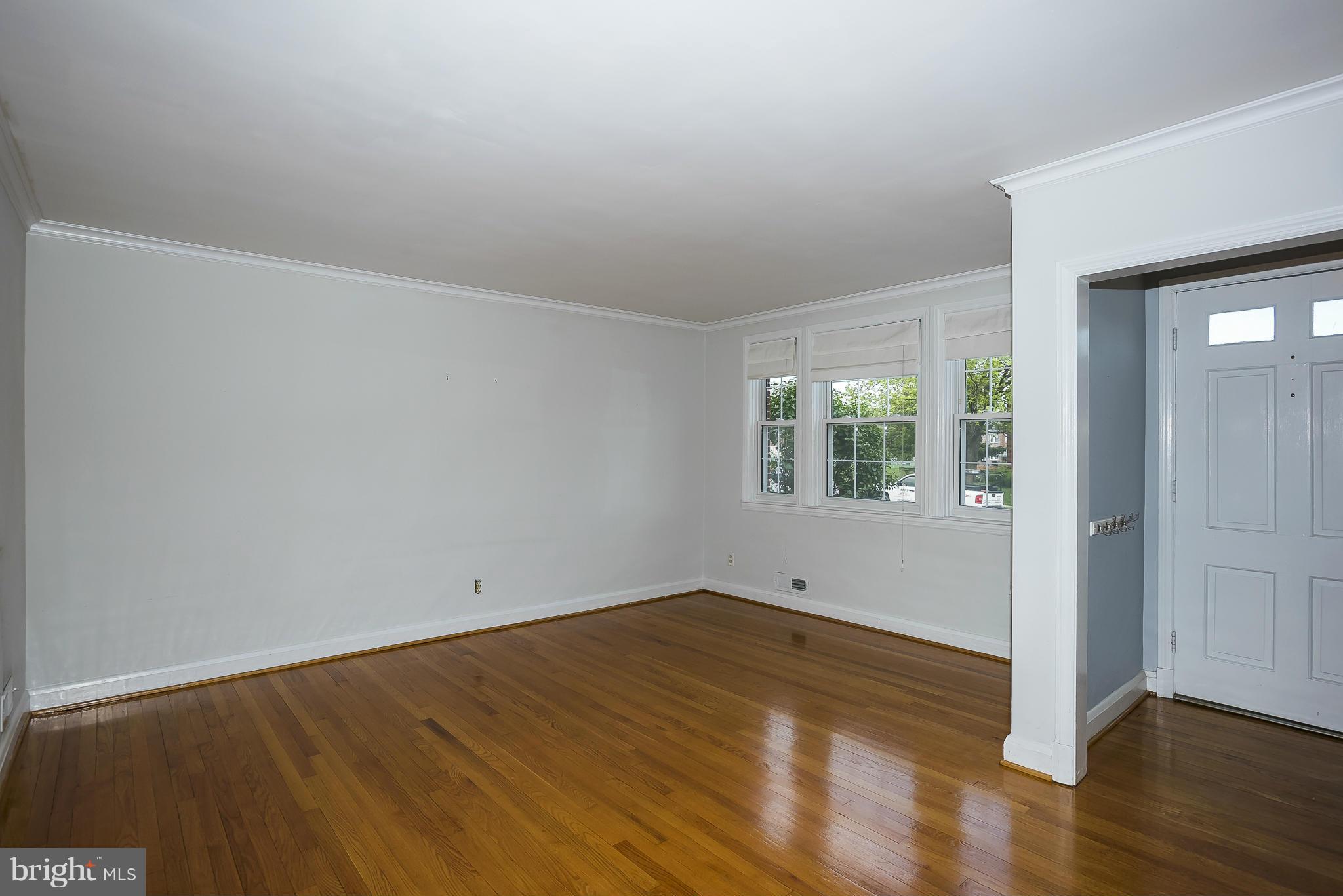 354 Greenlow Road Catonsville, MD 21228 - Photo 5 of 20 wooden floor in an empty room