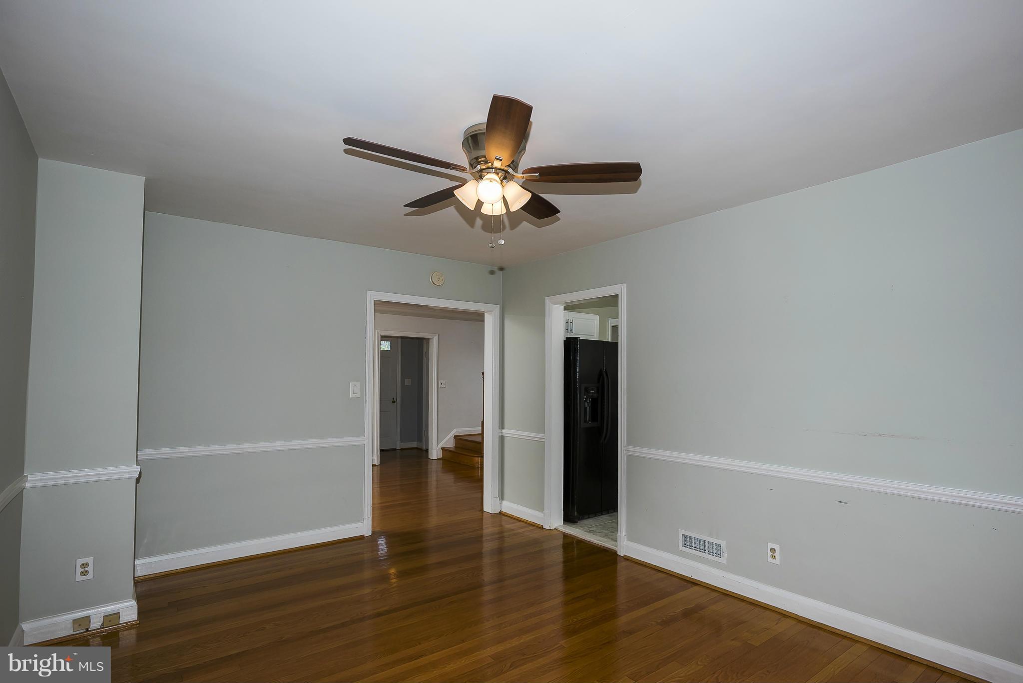 354 Greenlow Road Catonsville, MD 21228 - Photo 10 of 20 a view of an empty room and wooden floor