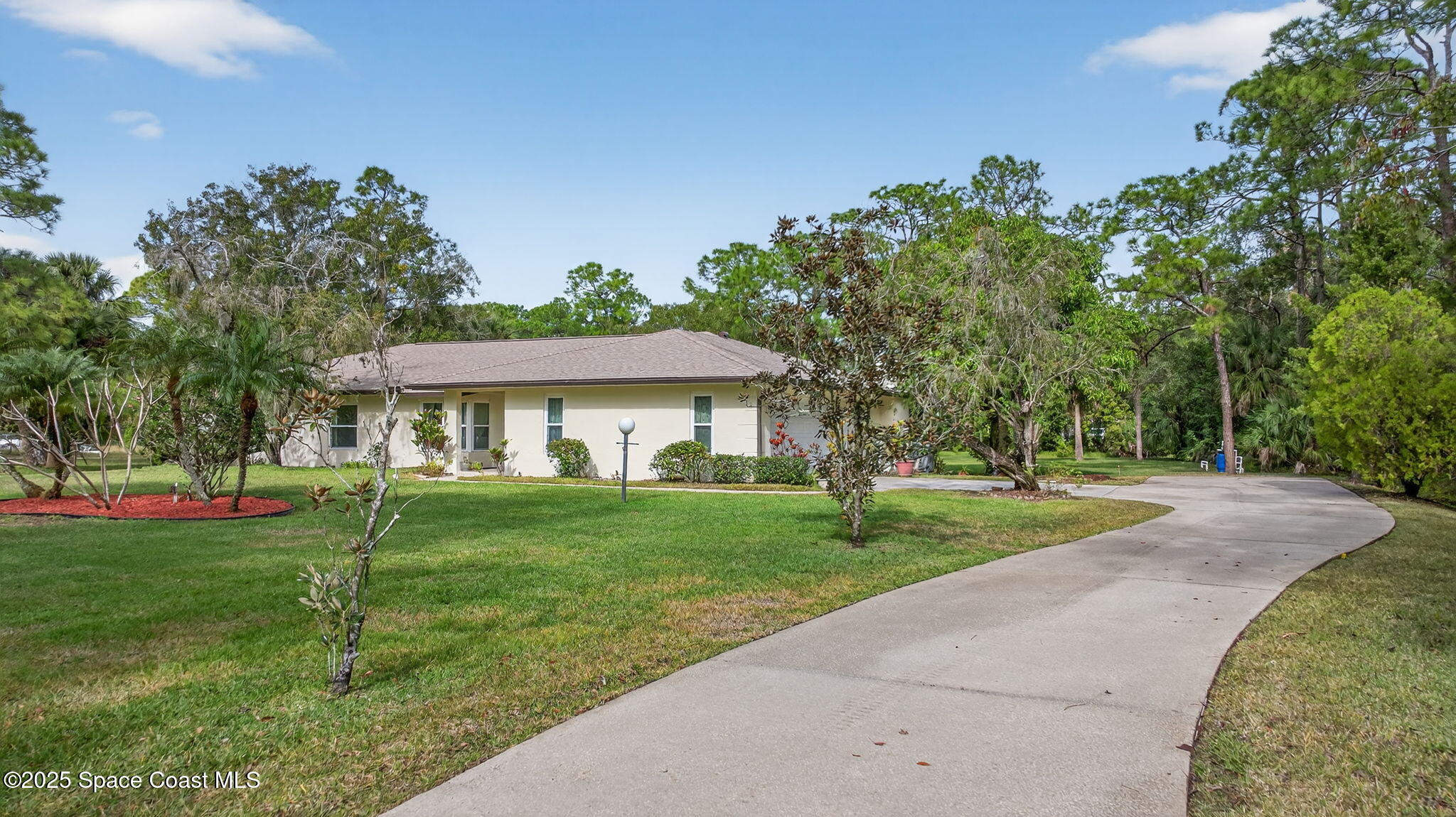 4356 Mustang Road Melbourne, FL 32934 - Photo 2 of 39 Long Driveway