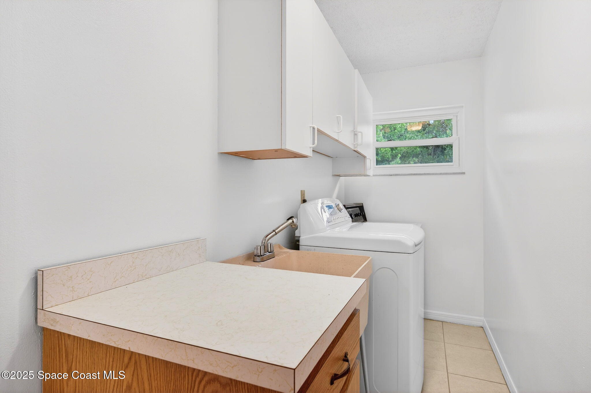 4356 Mustang Road Melbourne, FL 32934 - Photo 24 of 39 Laundry Room