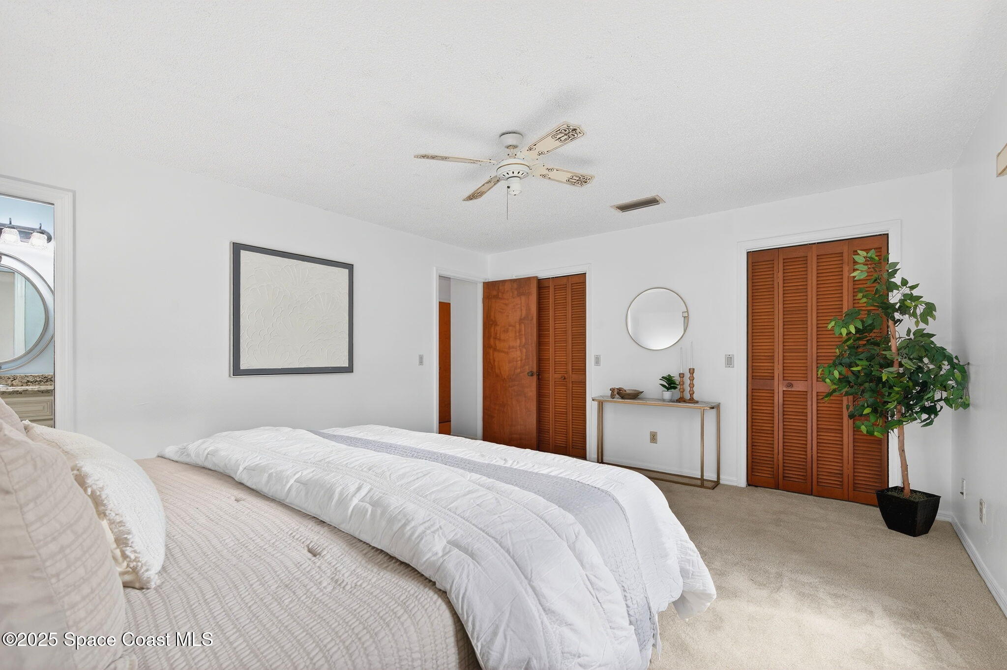 4356 Mustang Road Melbourne, FL 32934 - Photo 27 of 39 Primary Bedroom