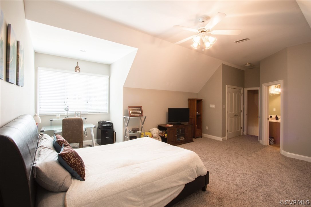 13420 Stonegate Road Midlothian, VA 23113 - Photo 29 of 41 a bedroom with a bed and furniture