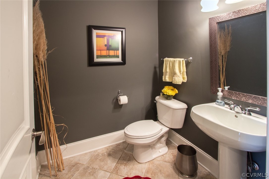13420 Stonegate Road Midlothian, VA 23113 - Photo 36 of 41 a bathroom with a sink toilet and mirror