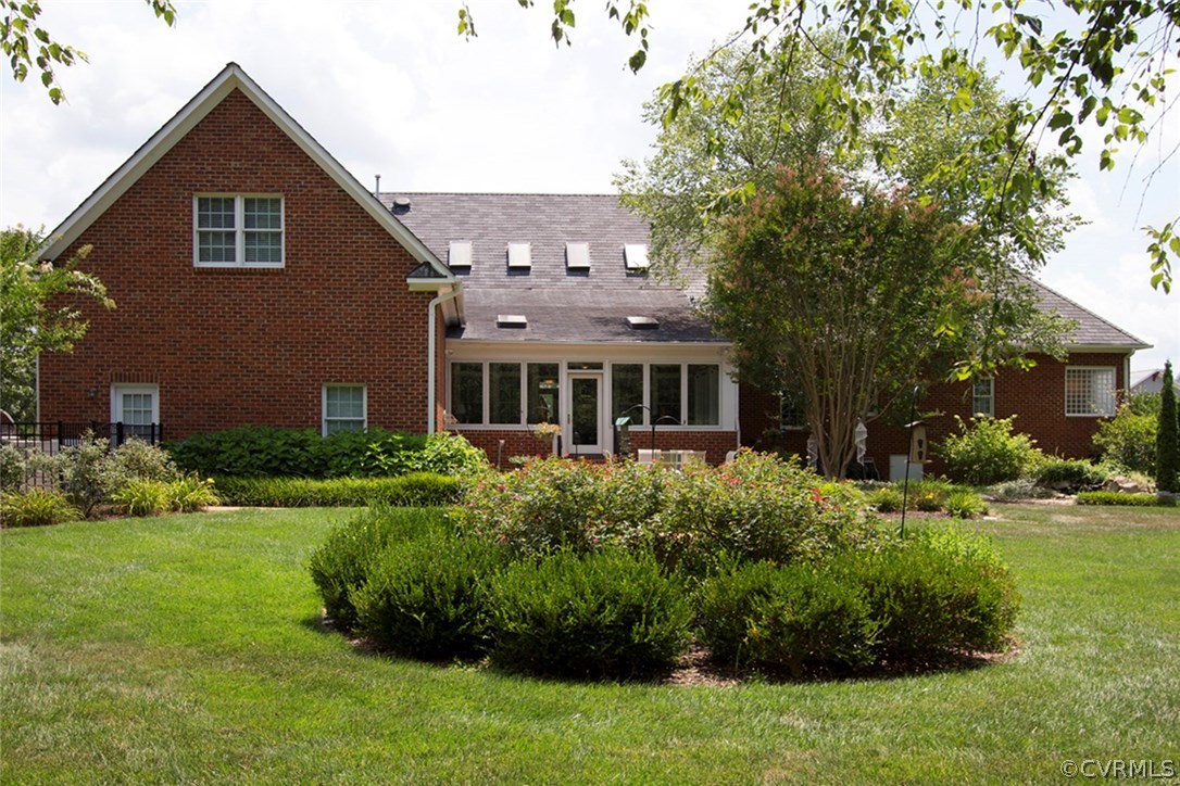 13420 Stonegate Road Midlothian, VA 23113 - Photo 41 of 41 a front view of a house with a yard