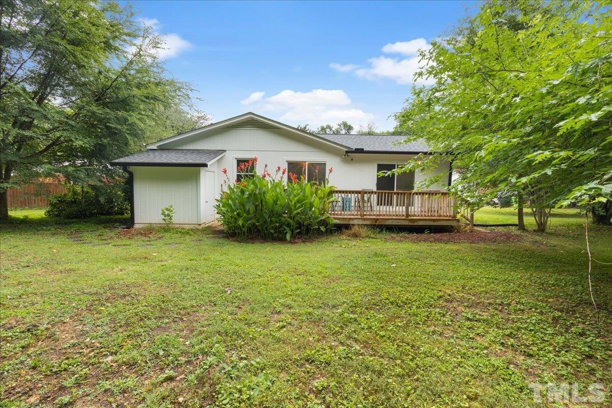 3101 Crandon Lane Raleigh, NC 27604 - Photo 15 of 18 a view of a house with backyard and garden