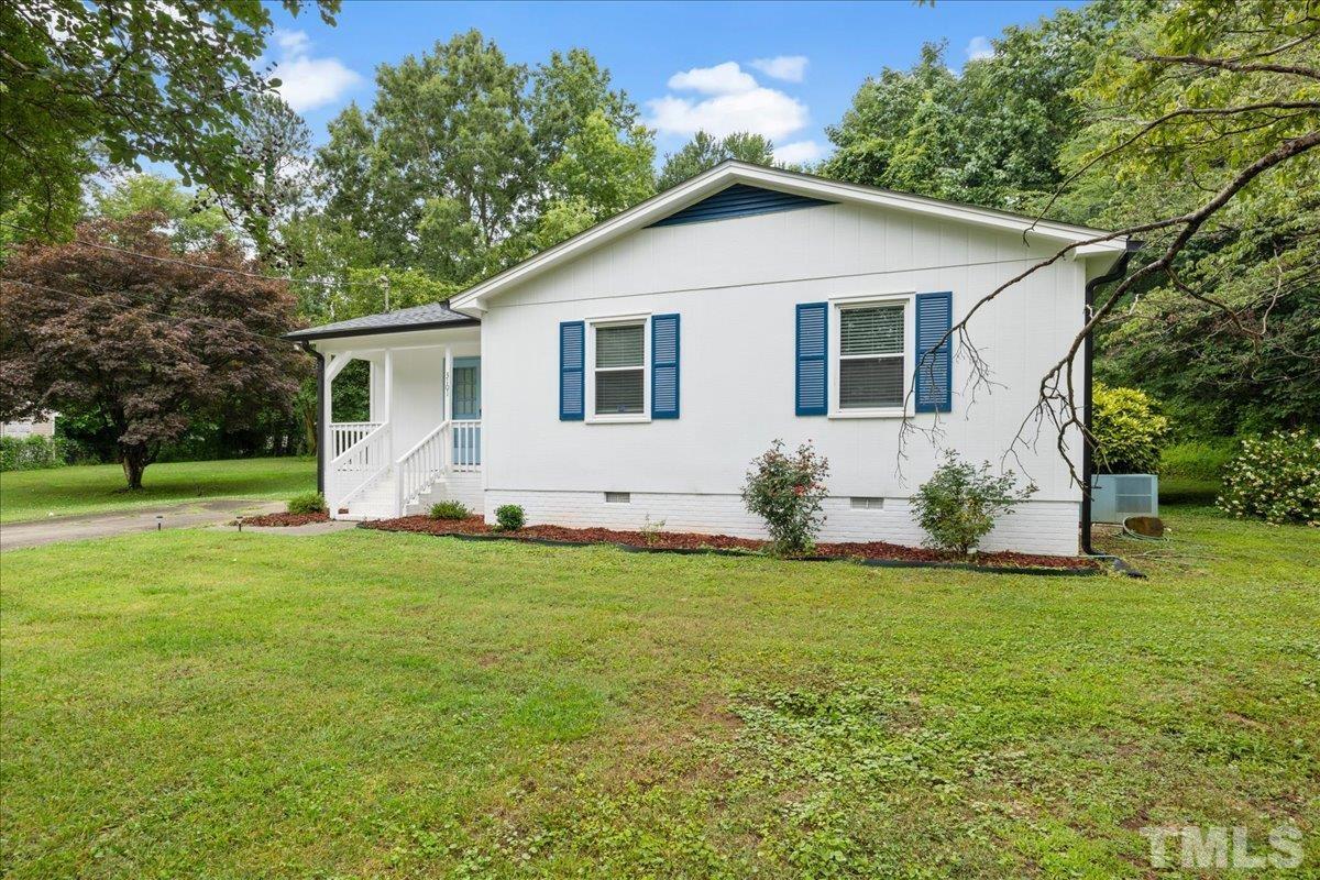3101 Crandon Lane Raleigh, NC 27604 - Photo 2 of 18 a view of a house with a yard