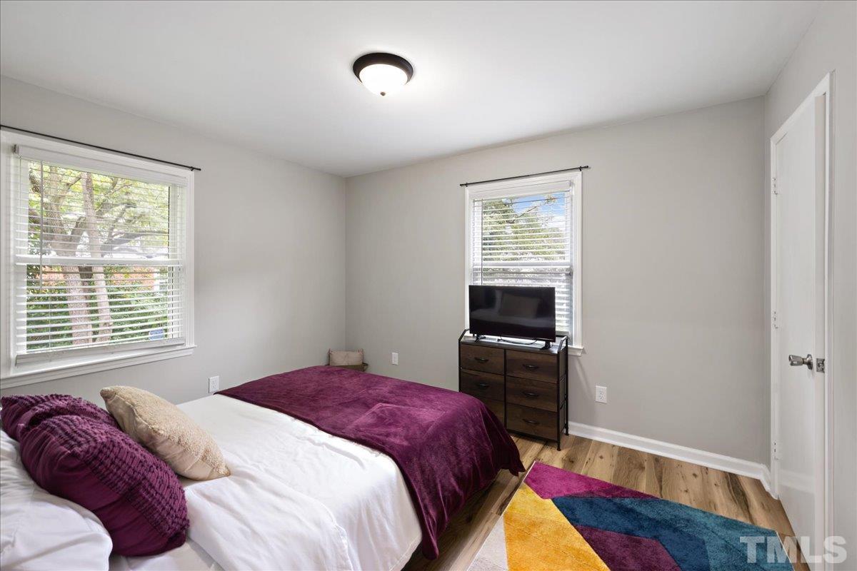 3101 Crandon Lane Raleigh, NC 27604 - Photo 10 of 18 a bedroom with a bed and a window