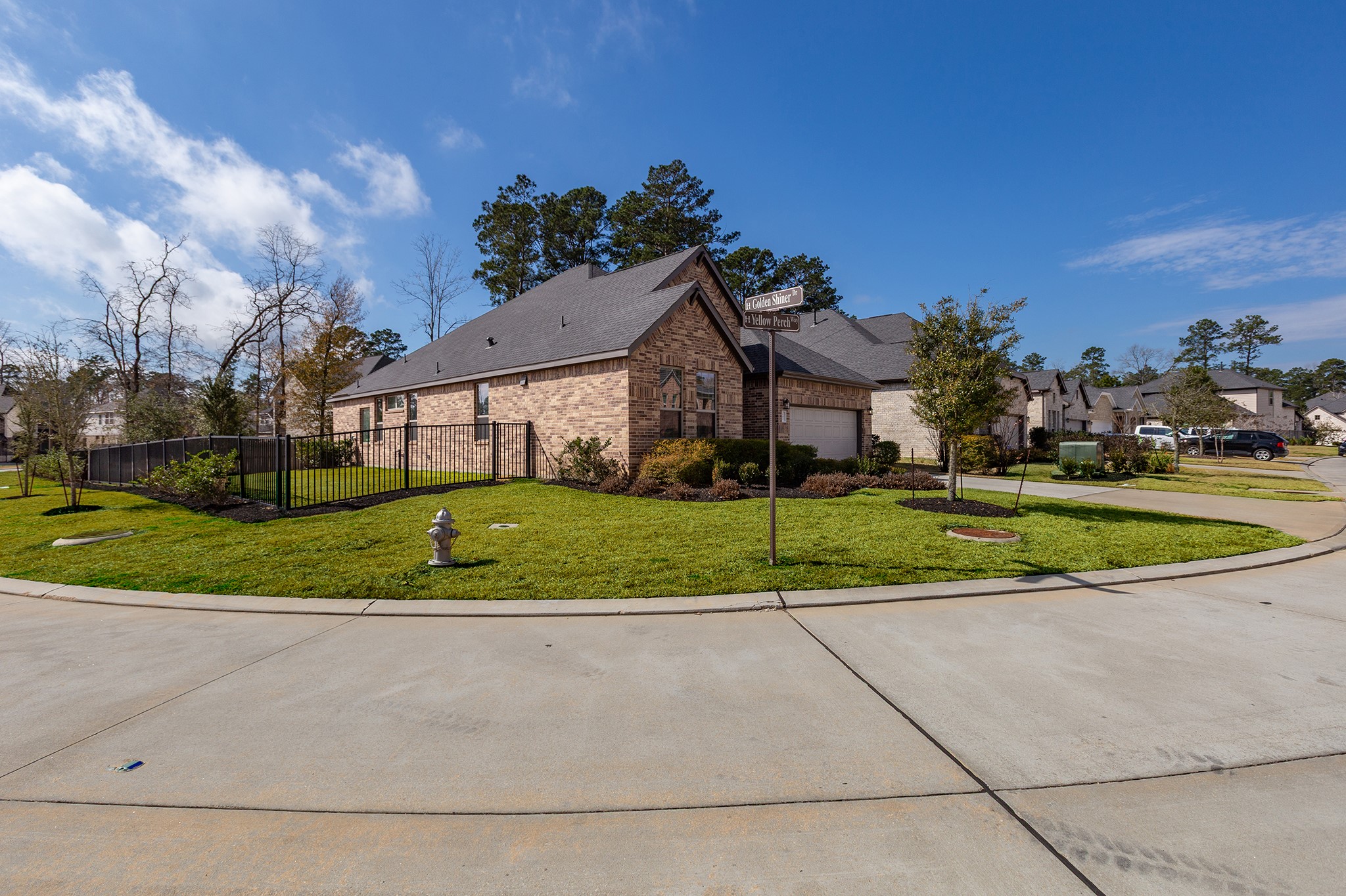 107 Yellow Perch Way Conroe, TX 77318 - Photo 20 of 44 Situated on a large corner lot, this home benefits from extra outdoor space and a more open setting.