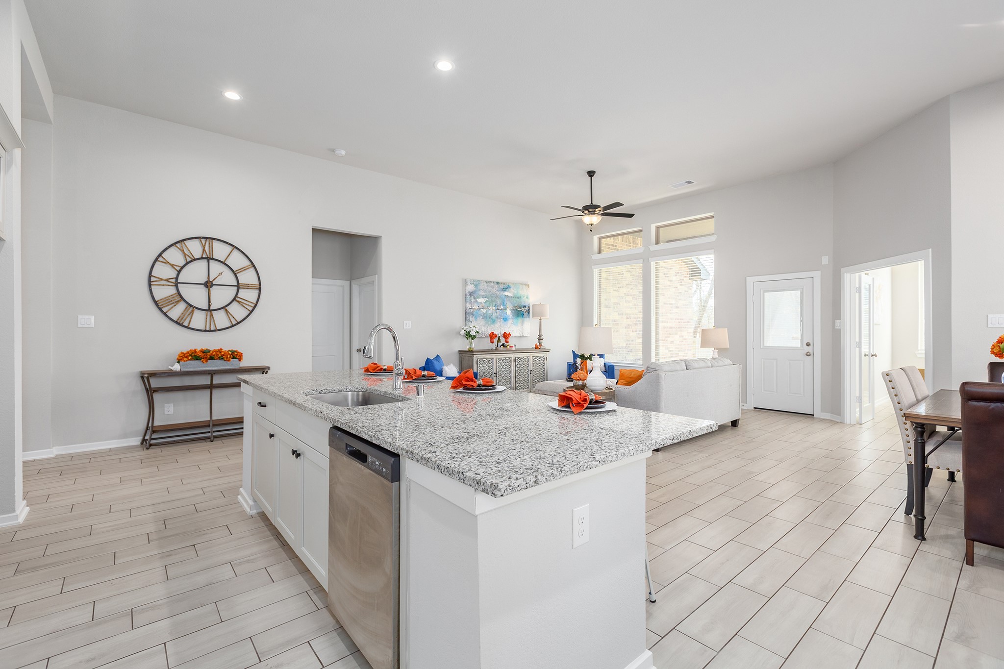 107 Yellow Perch Way Conroe, TX 77318 - Photo 6 of 44 Open living and kitchen view featuring the oversized island and seamless entertaining flow.