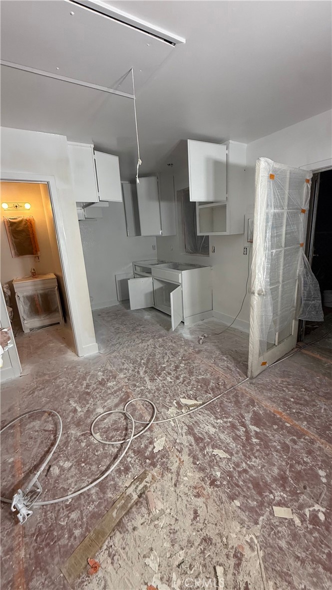 3049 Mulberry Street Riverside, CA 92501 - Photo 5 of 7 a bathroom with a sink and a mirror