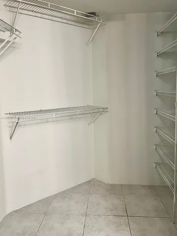 a view of a room with racks on the wall