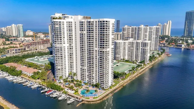 a view of balcony with a yard