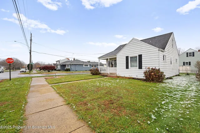 a view of a house with a swimming pool