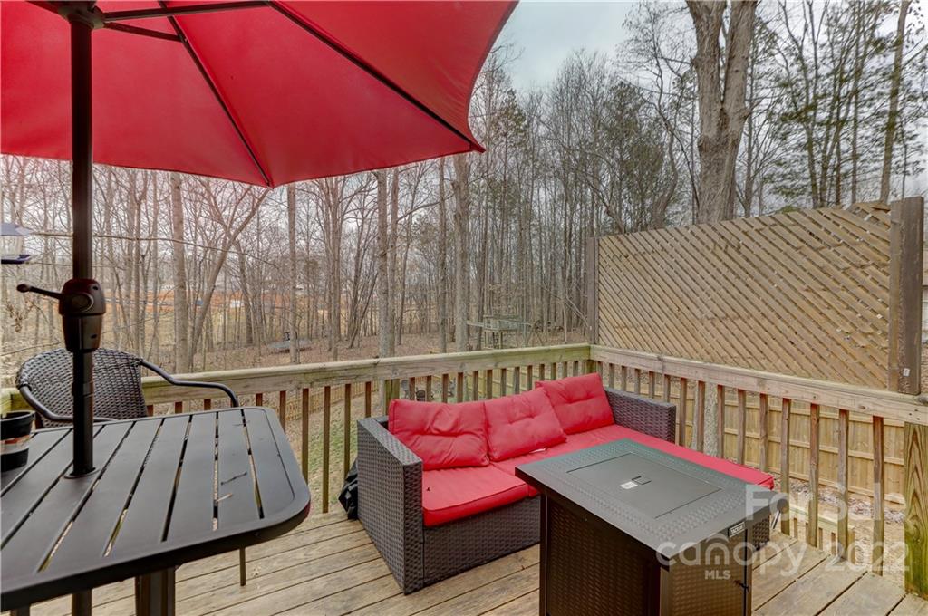 8216 Pine Oak Road Waxhaw, NC 28173 - Photo 36 of 39 a view of sitting area with furniture and wooden deck