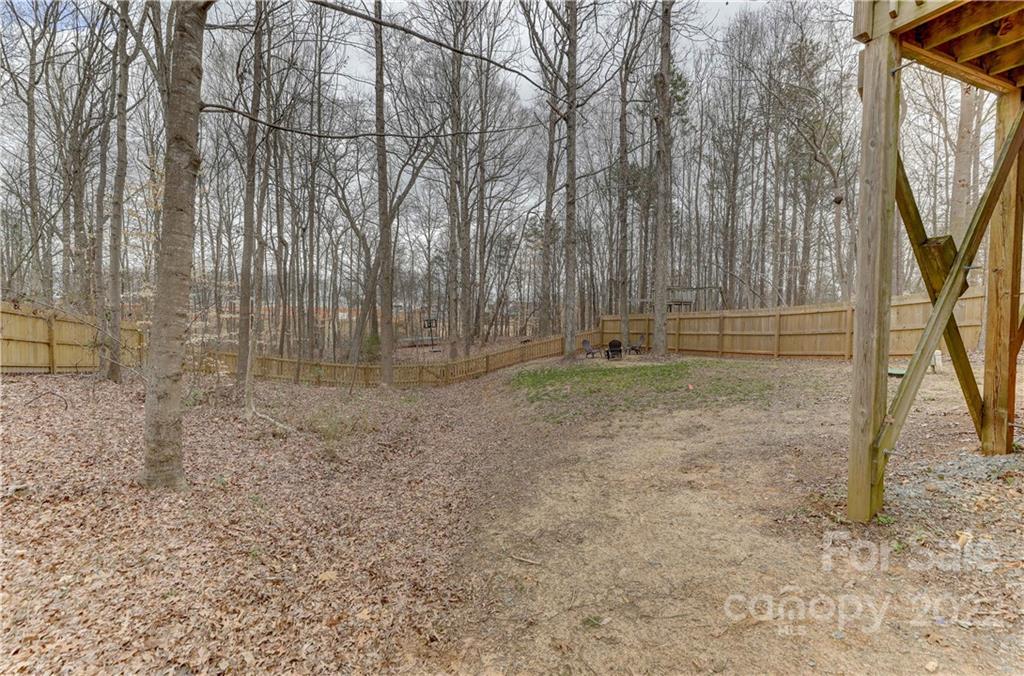 8216 Pine Oak Road Waxhaw, NC 28173 - Photo 39 of 39 a view of outdoor space with deck and tree