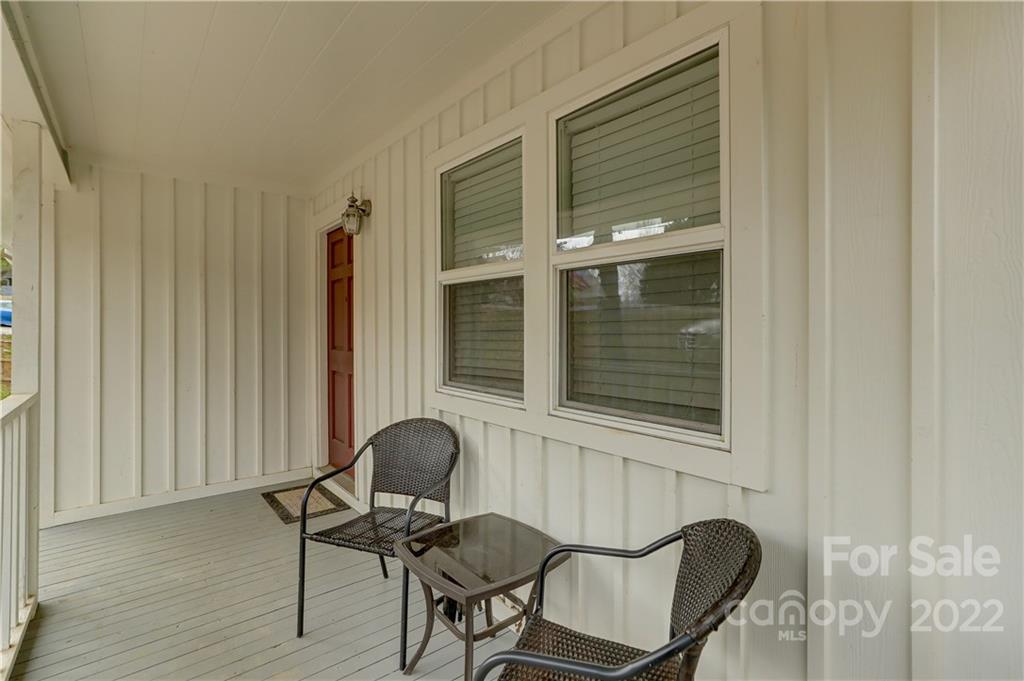 8216 Pine Oak Road Waxhaw, NC 28173 - Photo 5 of 39 a view of a chair and table in a room