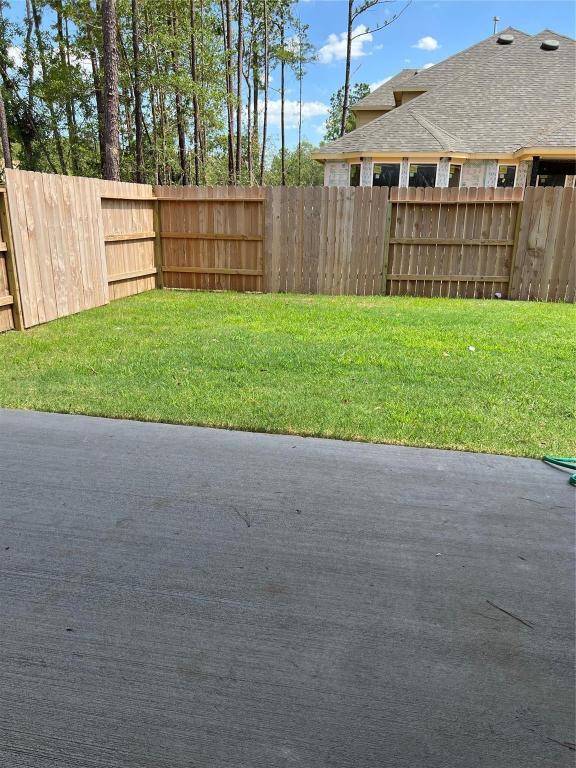 15707 Autumn Sun Conroe, TX 77302 - Photo 14 of 15 a view of backyard with green space